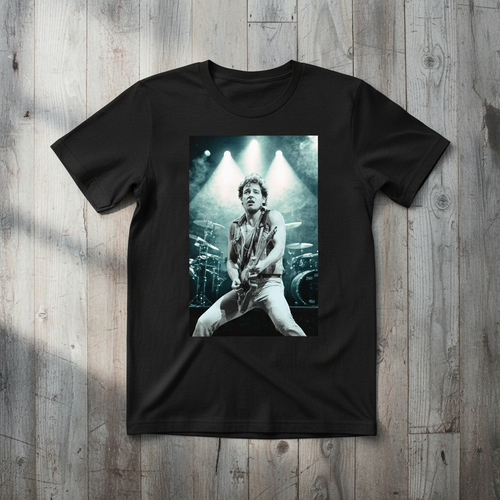 Black Bruce Springsteen t-shirt on wood background